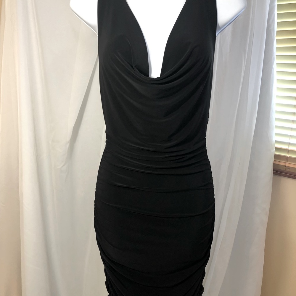 Body Central Black dress with V neck scoop neckline and laced design back
